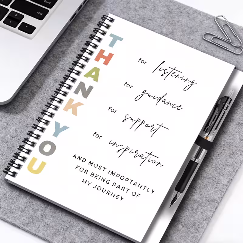 a set of gratitude themed spiral notebooks with pens with easy and fresh covers filled such as listening and support a powerful assistant for work and study used as a diary daily