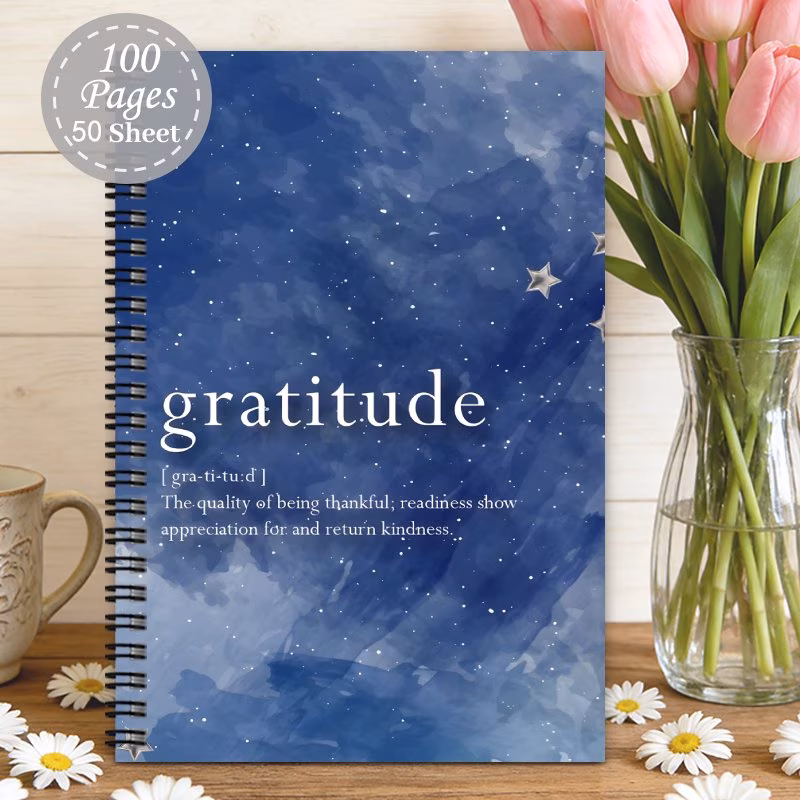 a hardcover spiral notebook designed for daily gratitude and self care this journal serves as a exercises for gratitude and reflection making it a workbook ideal for therapists family