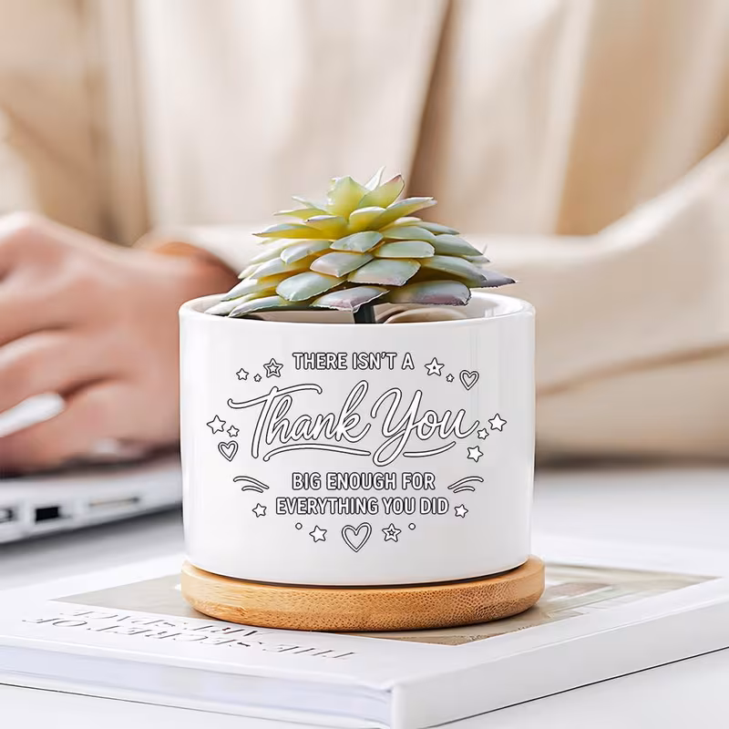 a round ceramic planter featuring a minimalist line with stars and hearts accompanied bamboo saucer this decorative vase with thank you serves as a thoughtful gift of appreciation for colleagues frien