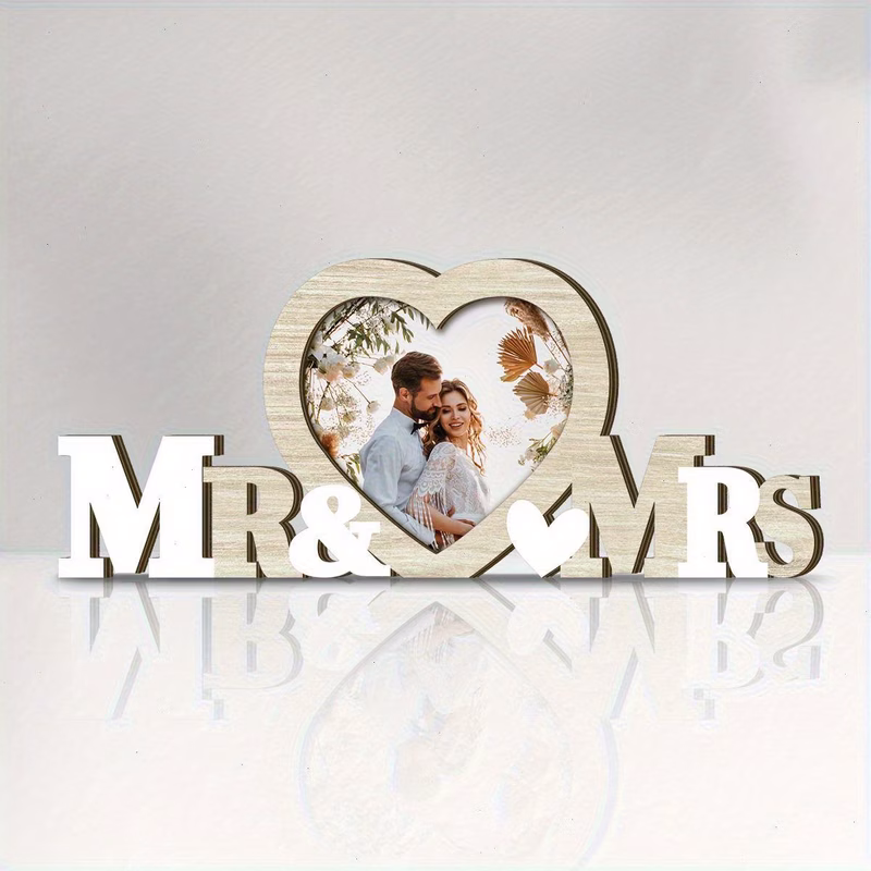this traditional wooden heart shaped photo frame is designed for couples showcasing a tone perfect for romantic wedding photos its horizontal tabletop stand it an ideal for couples