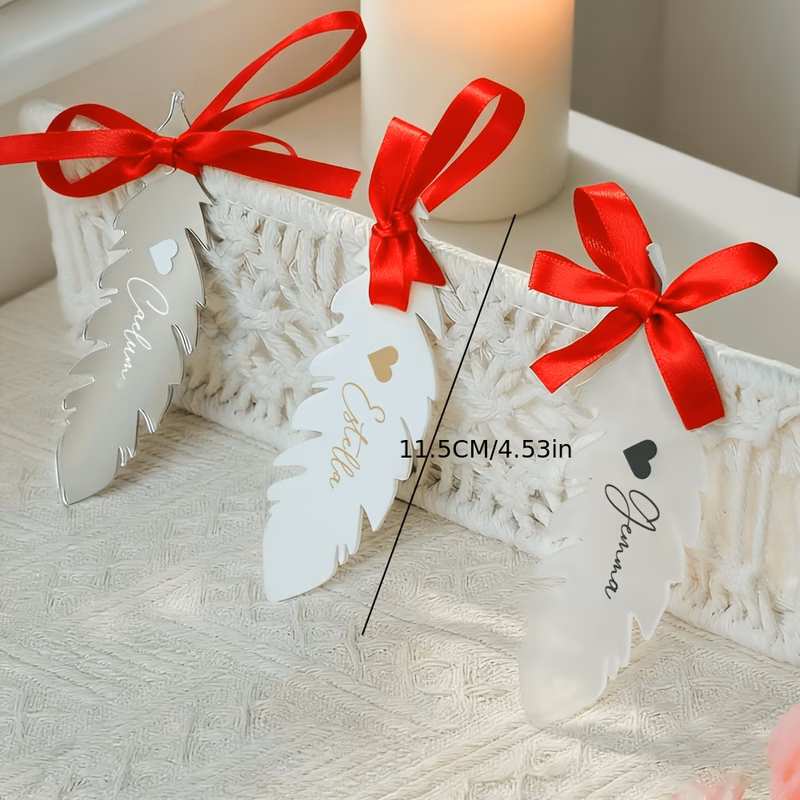 2d flat a custom holiday ornament that personalized with a 2d name cut in of a feather party decorations christmas tree stockings name tags and commemorative gifts for family or friends
